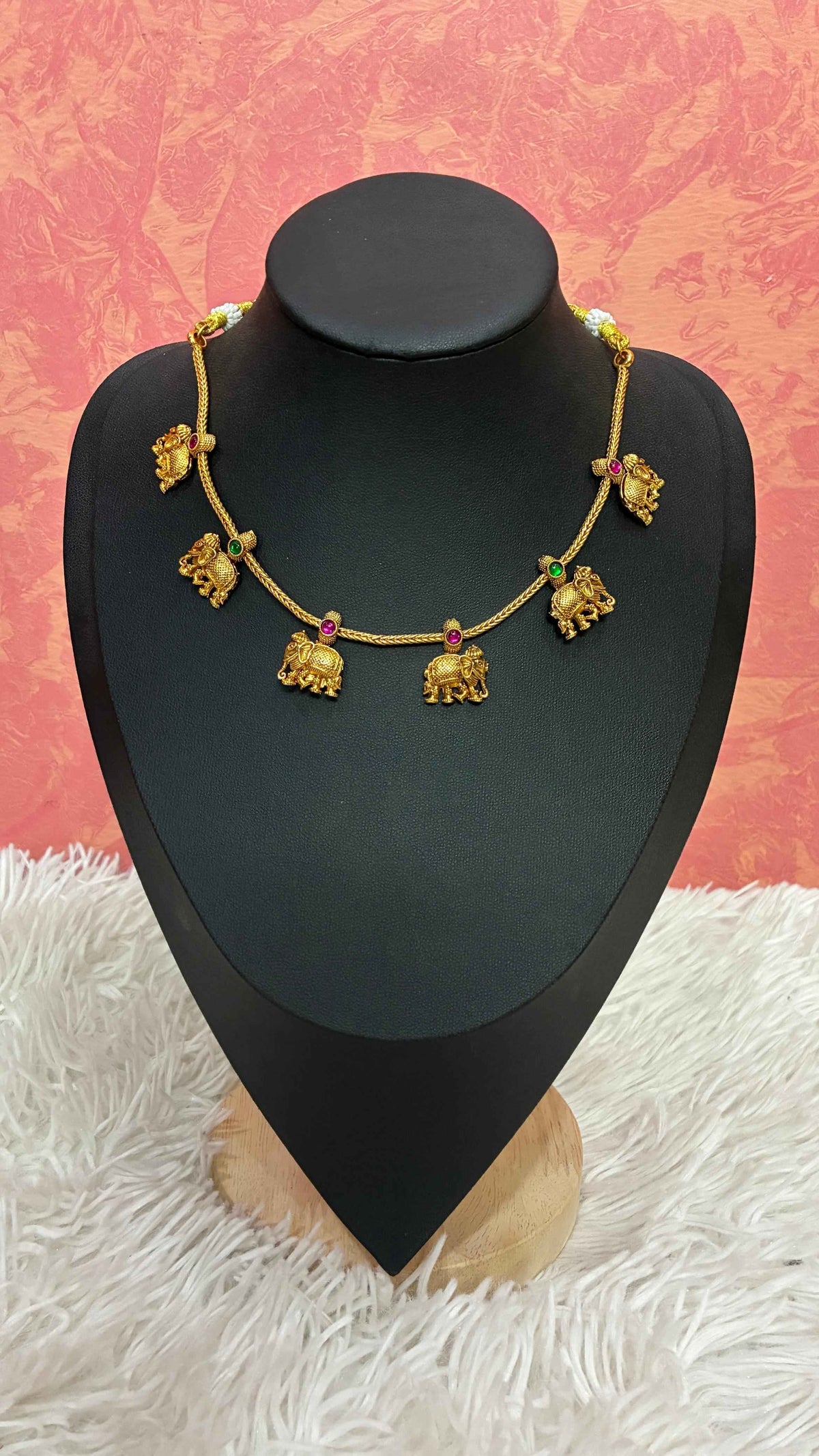 Micro-gold-plated elephant motif necklace and matching earring set
