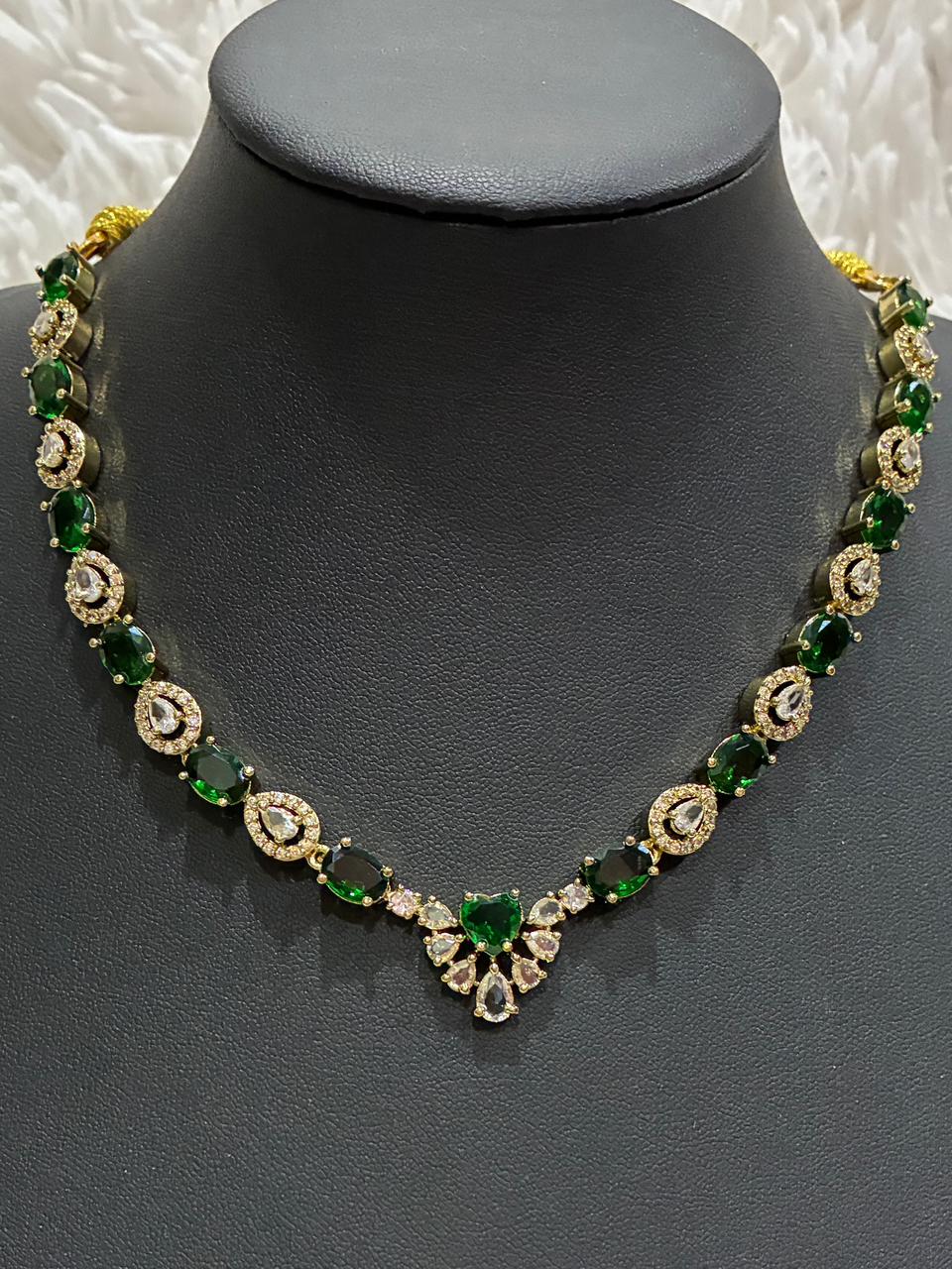 Tanish Art Jewellery Elegant Glow necklace set featuring emerald green and American Diamond (AD) stones