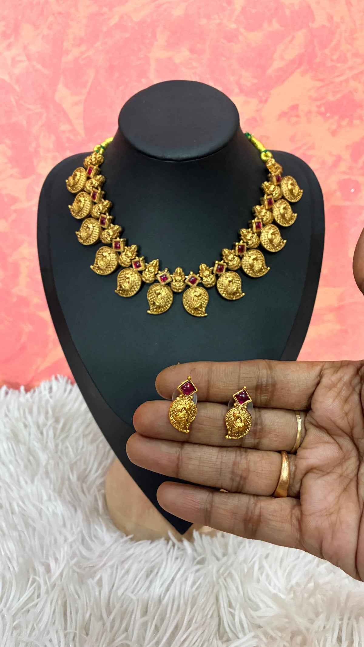 Antique-finish mango necklace featuring intricate paisley motifs