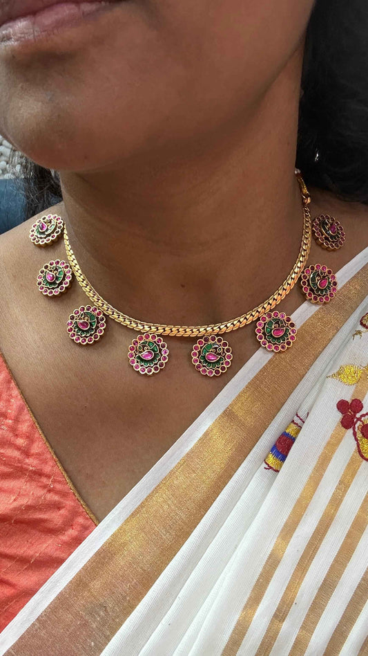 Ruby-pink and green floral and peacock motifs Necklace Set