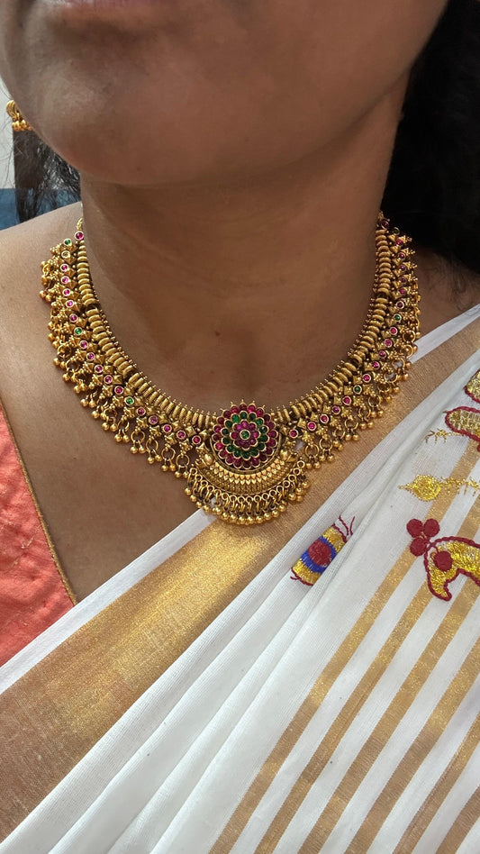 Floral kemp stone pendant and matching jhumka earrings