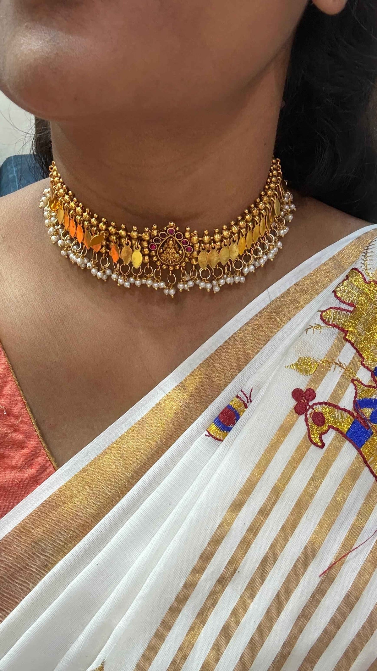Elakkathali Choker Necklace featuring a central Lakshmi motif
