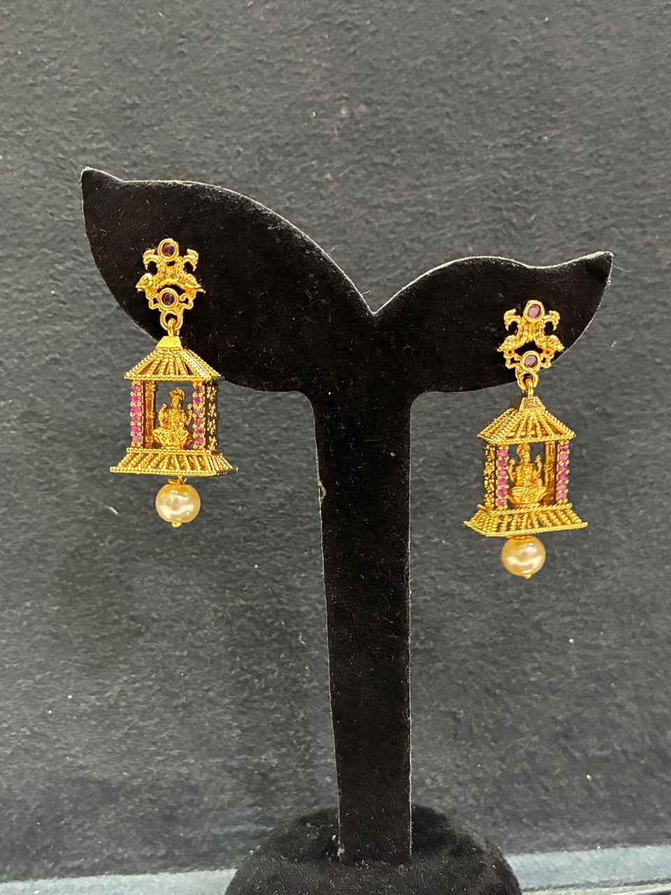 Jhumka earrings gold-plated Lakshmi motif within a peacock-accented cage design