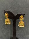 Gold-plated jhumka earrings feature a statement design