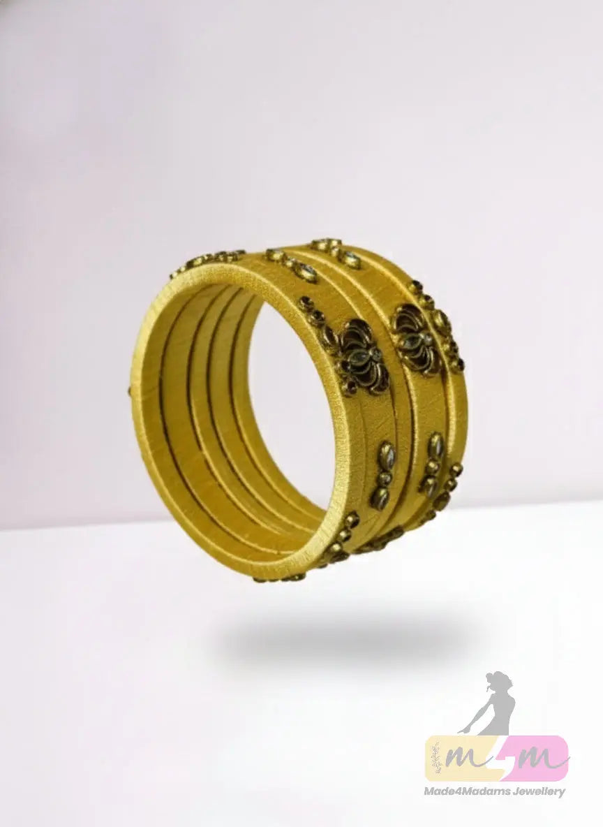 Radiate elegance Golden Glow Silk 6 Bangle Set Made4Madams