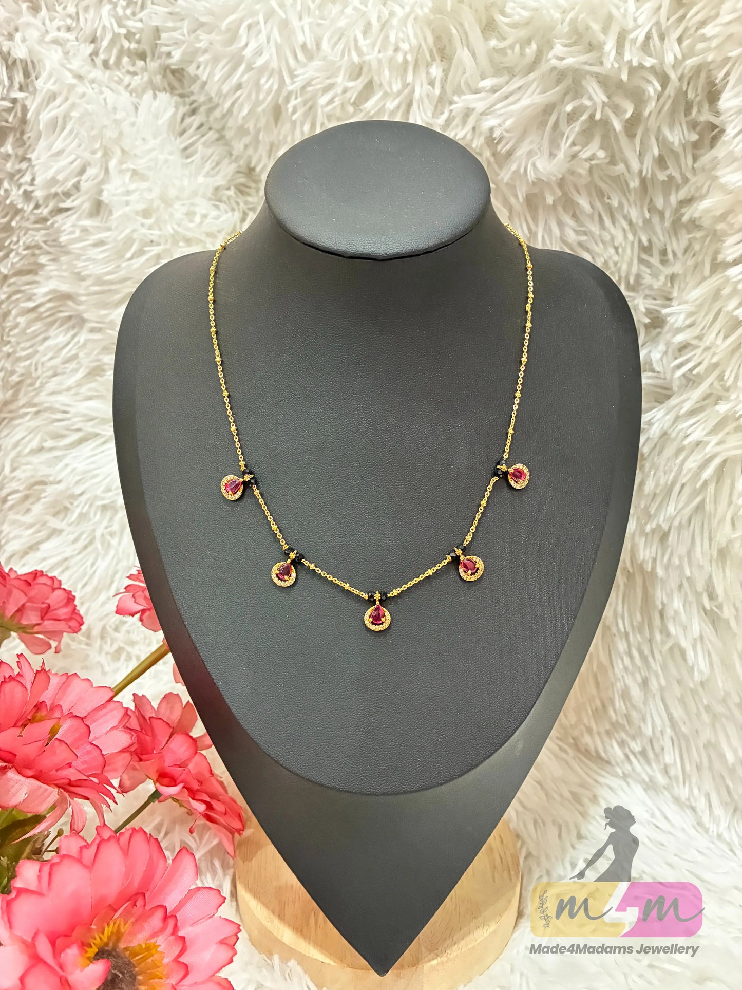 Gold-Plated Black Beaded Mangalsutra with pink Drop Pendants Made4Madams