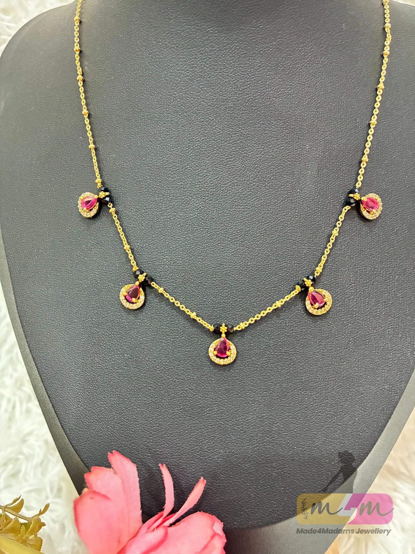 Gold-Plated Black Beaded Mangalsutra with pink Drop Pendants Made4Madams