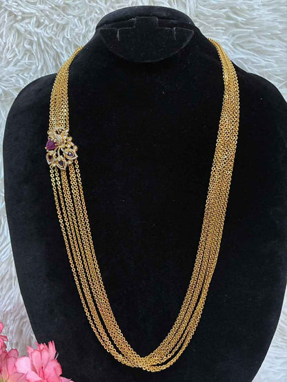 Necklace - 7 Lines Chandraharam with Stoned Floral Side Pendant
