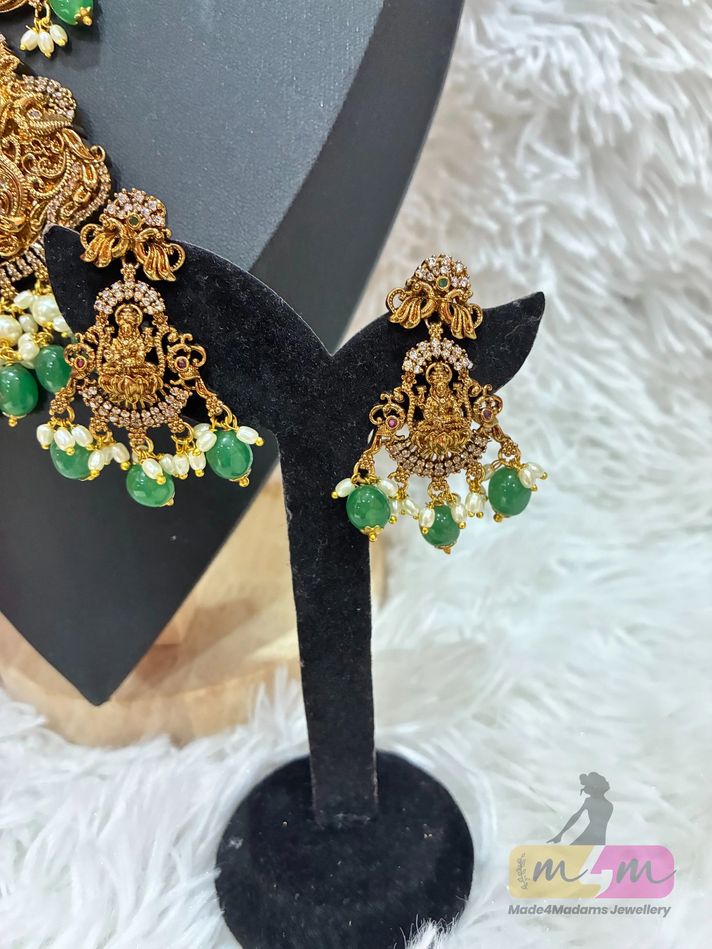 Gold-plated temple style necklace with a Goddess Lakshmi pendant and matching  earrings with green beads Made4Madams
