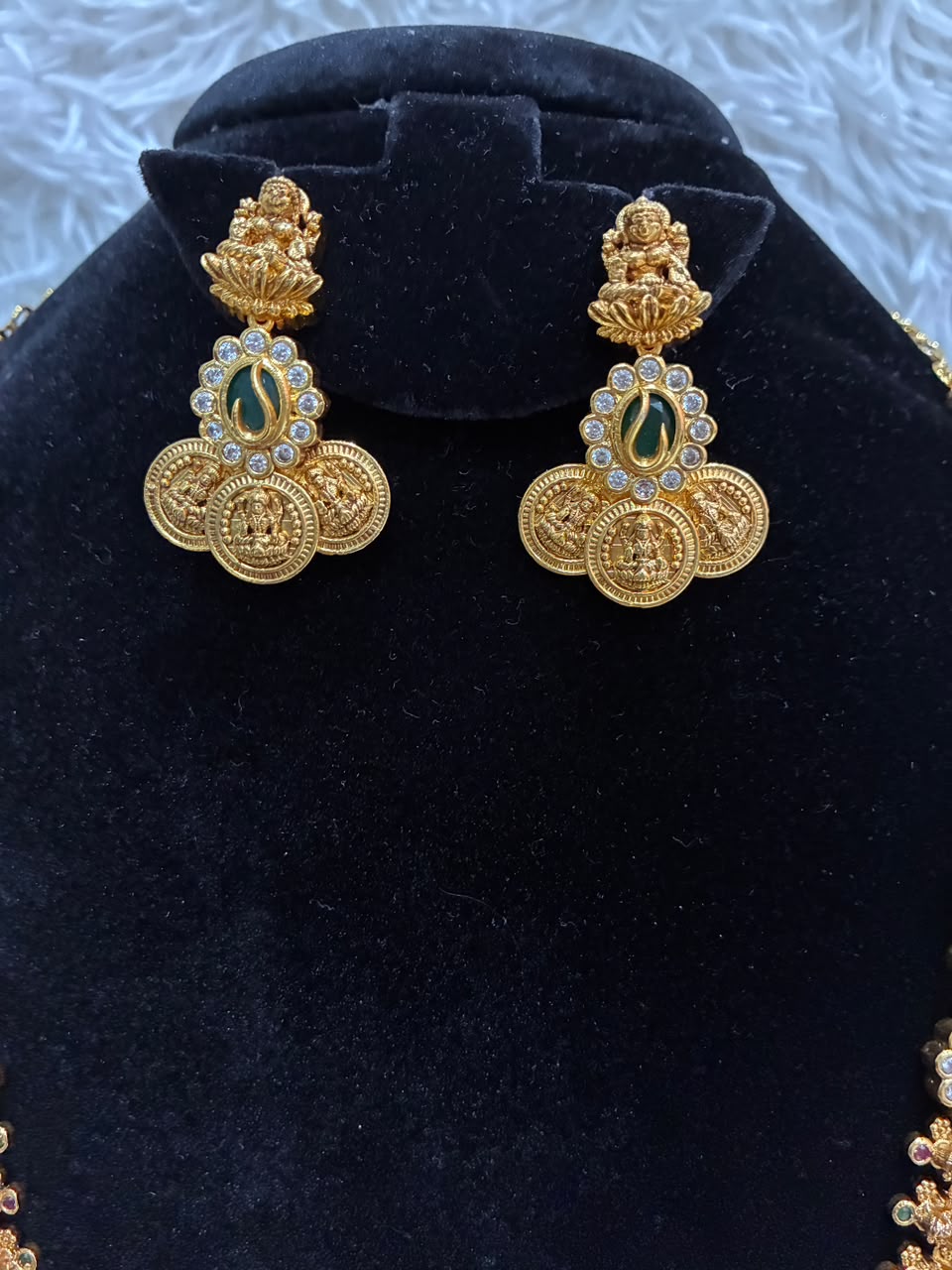 Gold plated Lakshmi coin haram necklace set with green stone