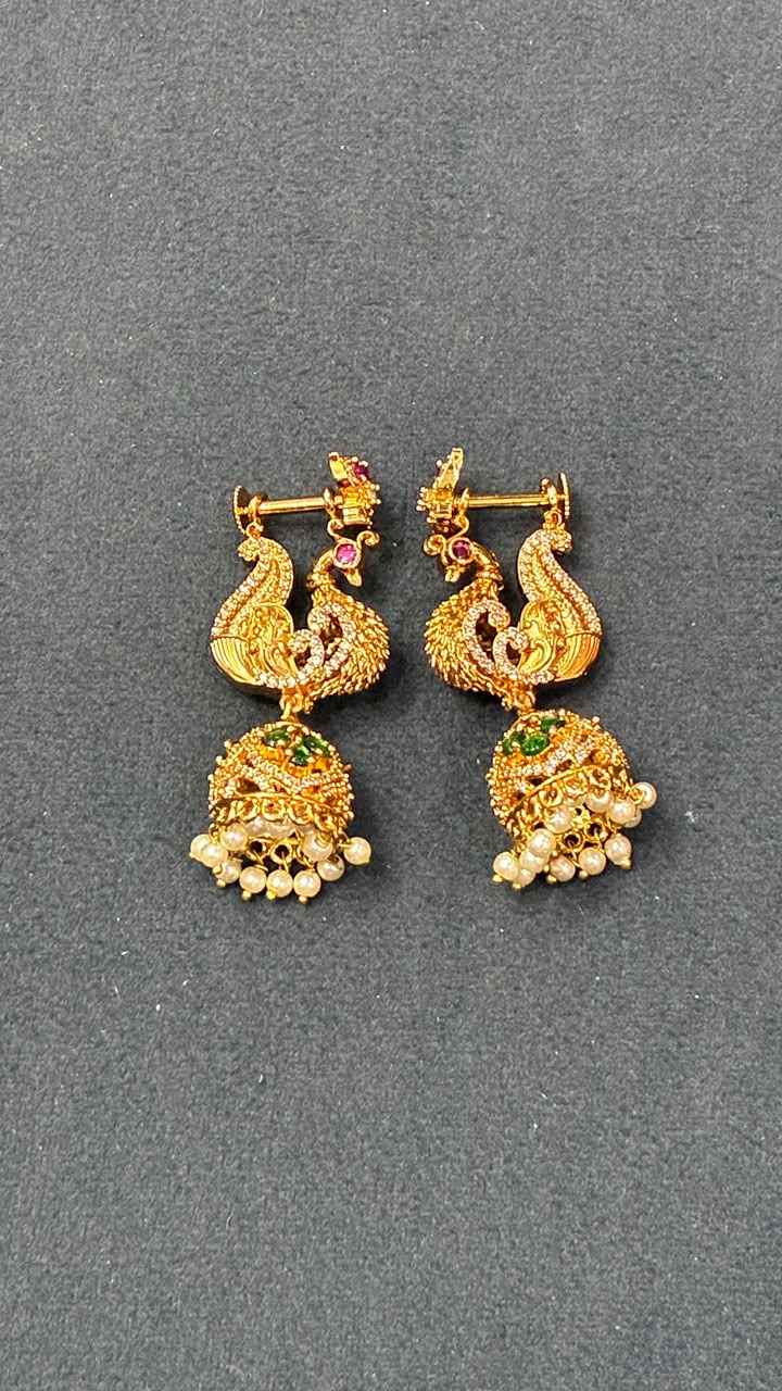 Makarakundanalu feature a detailed peacock design adorned with Pearls