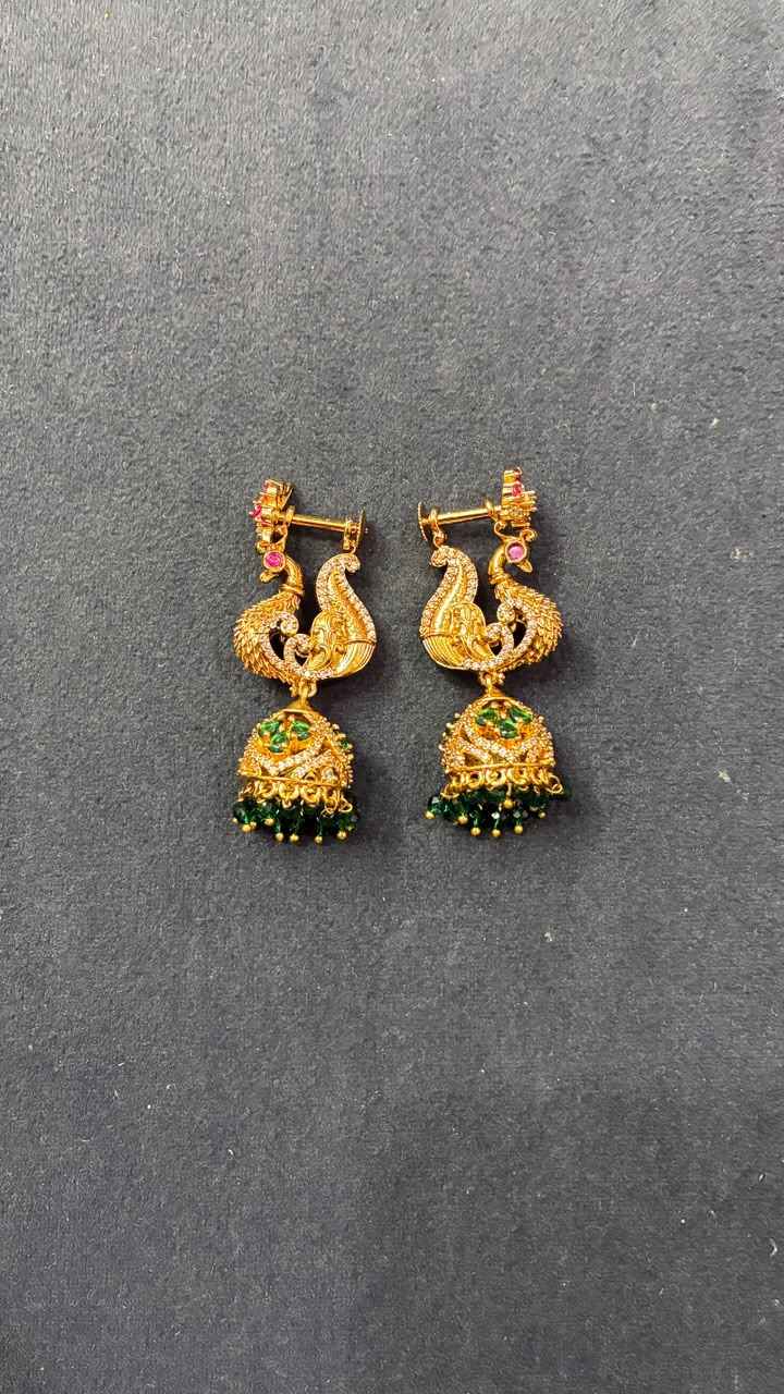 Makarakundanalu feature a detailed peacock design with Green Beads