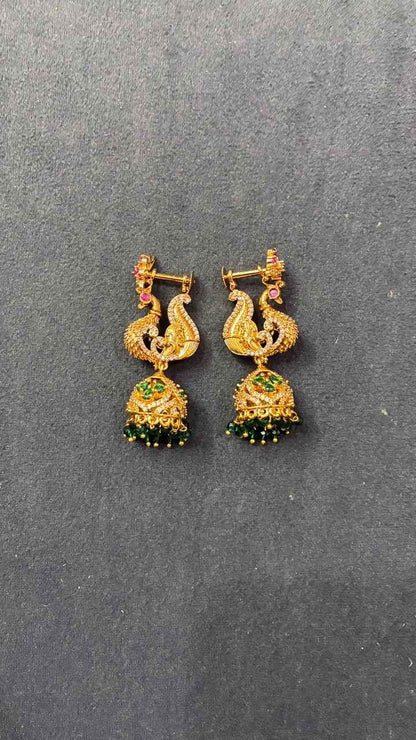 Makarakundanalu feature a detailed peacock design with Green Beads