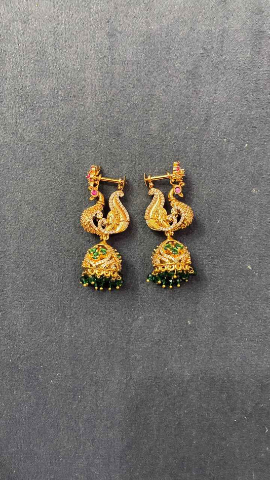 Makarakundanalu feature a detailed peacock design with Green Beads