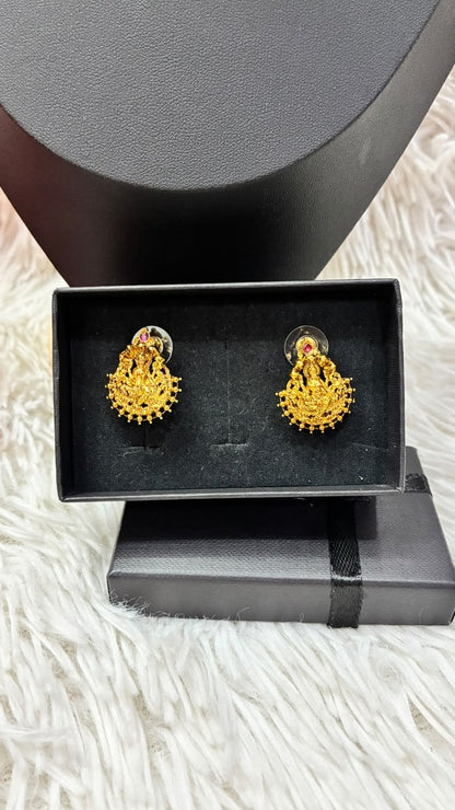 Lakshmi nanu necklace set features a traditional gold-plated design