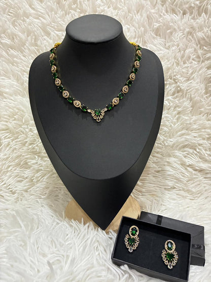 Tanish Art Jewellery Elegant Glow necklace set featuring emerald green and American Diamond (AD) stones