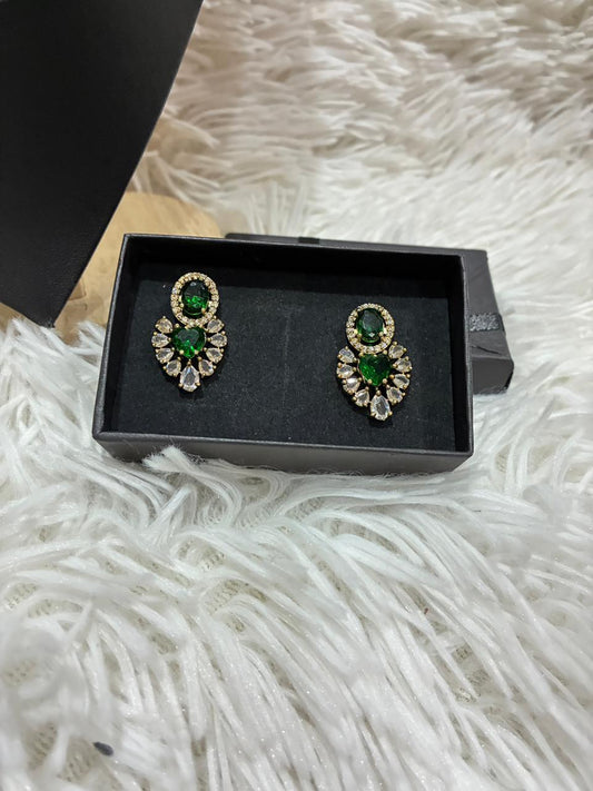 Tanish Art Jewellery Elegant Glow necklace set featuring emerald green and American Diamond (AD) stones