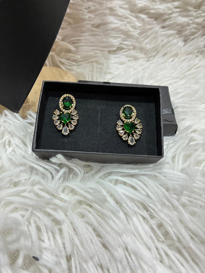 Tanish Art Jewellery Elegant Glow necklace set featuring emerald green and American Diamond (AD) stones