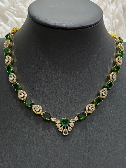 Tanish Art Jewellery Elegant Glow necklace set featuring emerald green and American Diamond (AD) stones