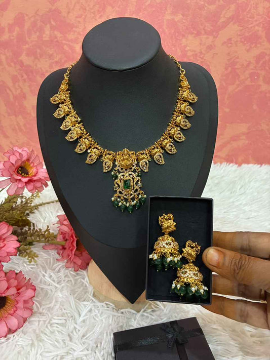 Gold-plated temple style Lakshmi motif necklace set with Mango shaped design