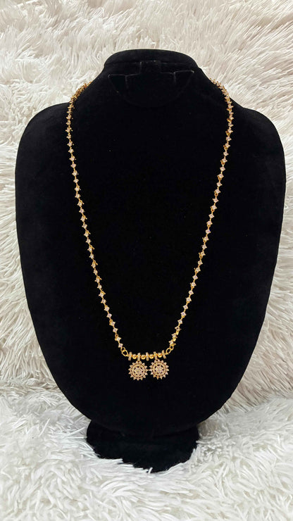 Diamond Replica Thali Chain with Locket featuring a gold-toned chain