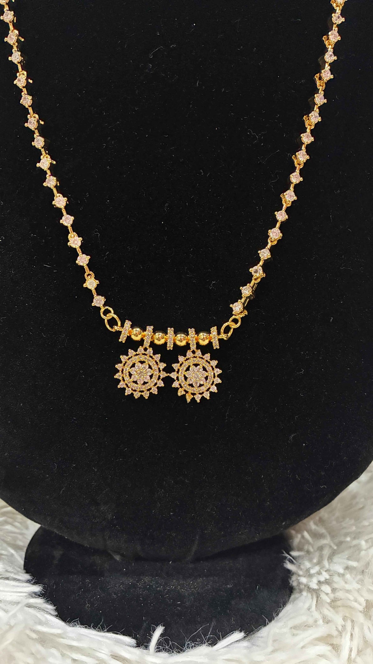 Diamond Replica Thali Chain with Locket featuring a gold-toned chain